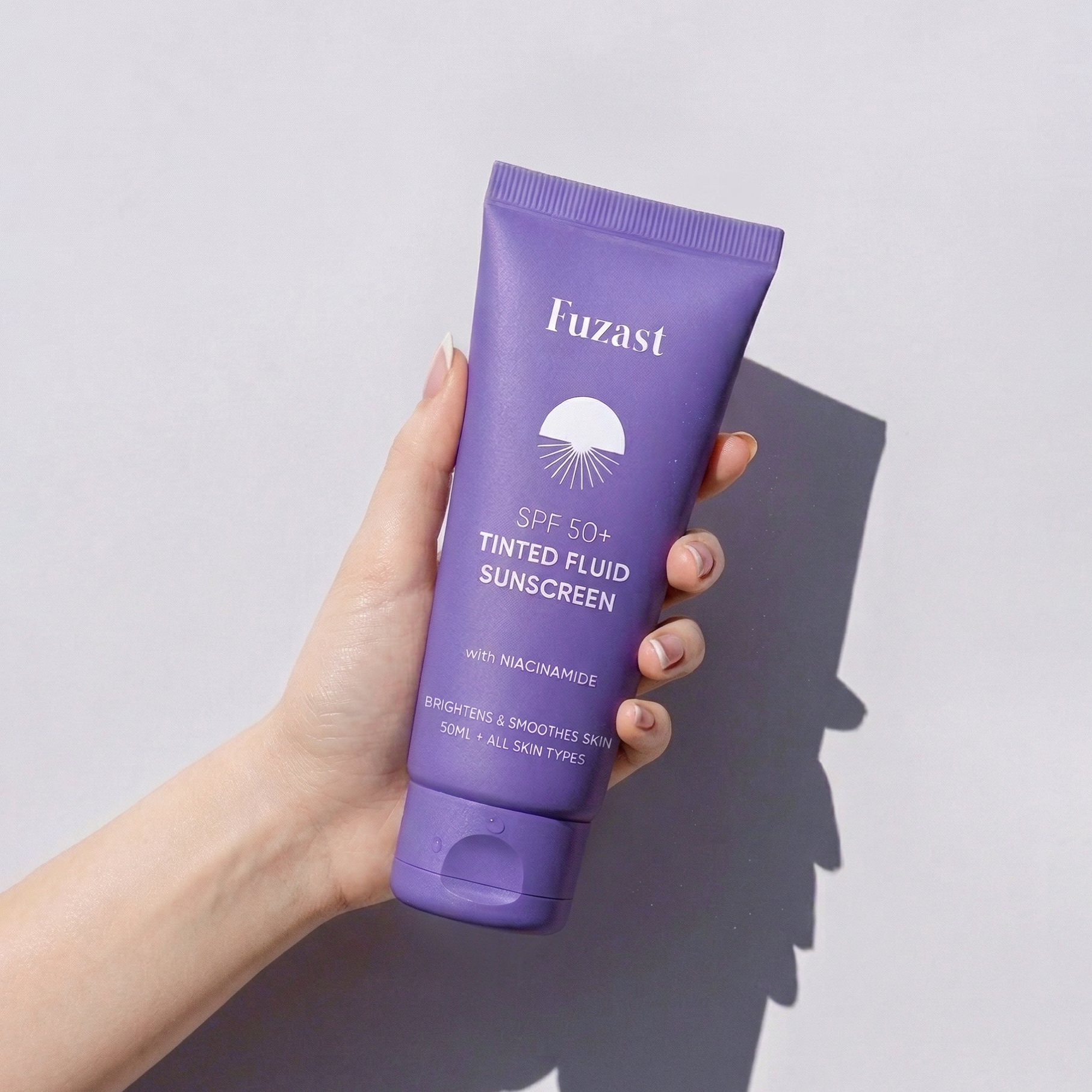 Fuzast® SPF 50 Tinted Fluid Sunscreen with Niacinamide